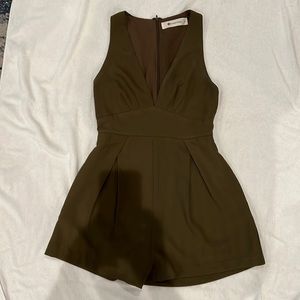 Army green romper with side pockets.